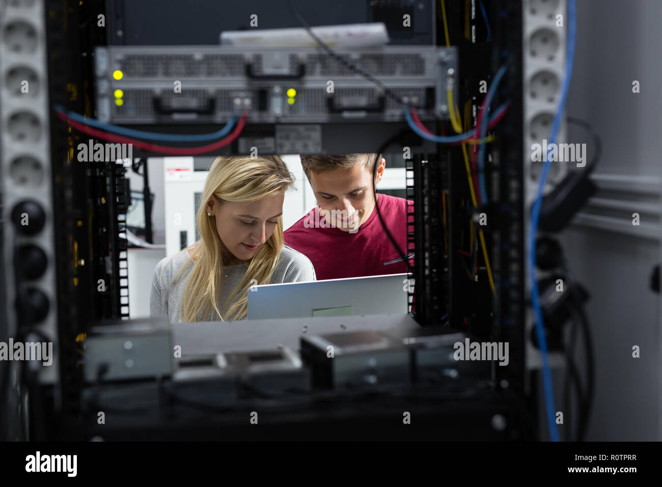 Two IT Engineers in Data Center, Server Room Stock Photo - Alamy