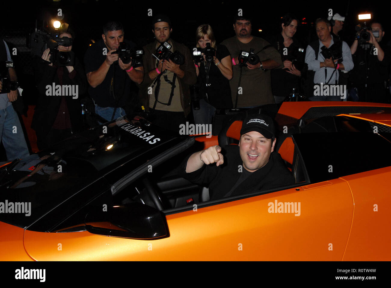 Greg Grunberg  at the Race To Fight Against Epilepsy Benefit at the Lamborghini in Calabasas in Los Angeles.  with the press in the back eye contact   Stock Photo