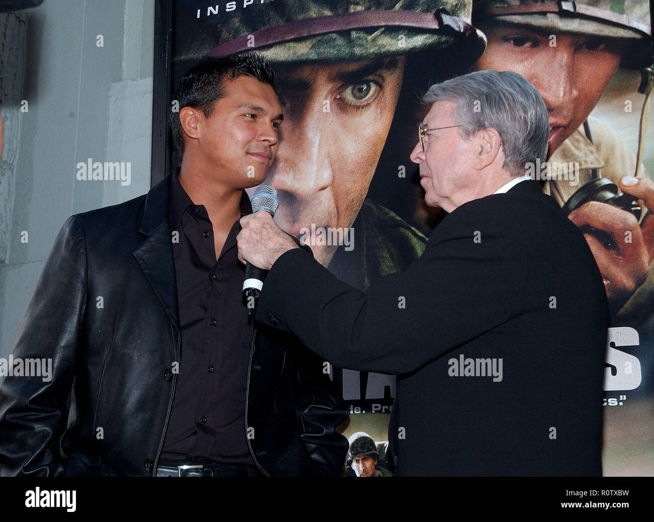 Army Archerd and Adam Beach at the Windtalkers premiere at the Chinese Theatre in Los Angeles. June 11, 2002.          -            ArcherdA BeachA02. Stock Photo