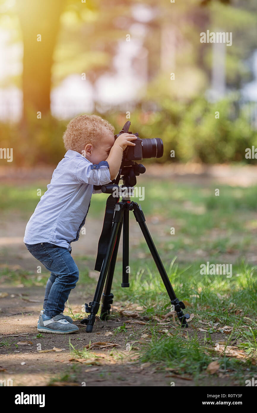 A two years old boy is photographer Stock Photo Alamy