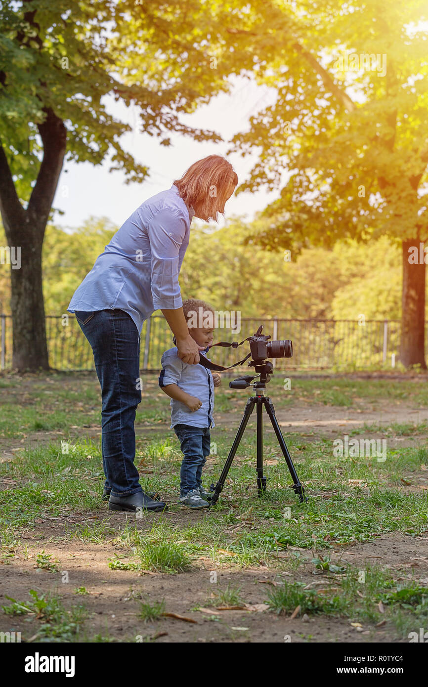 A two years old boy is photographer Stock Photo Alamy