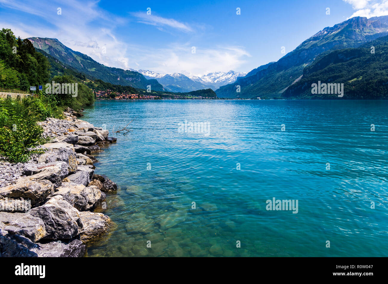 Lake side  mountain landscape, emerald water, summer, blue sky Stock Photo