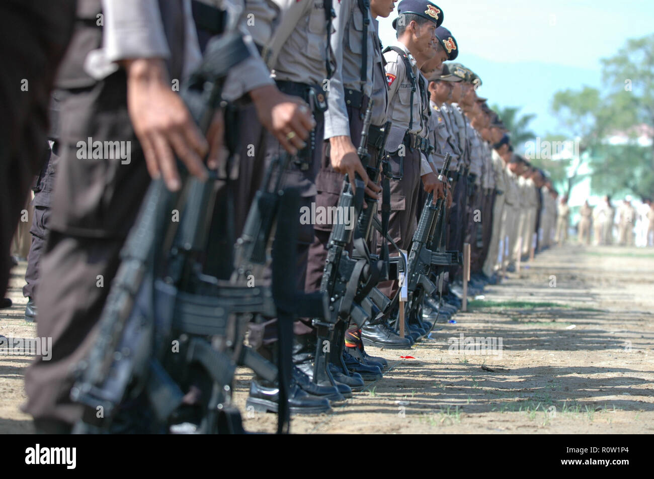 Banda Aceh, Indonesia - August 16, 2005: Indonesia Police with Indonesian Flag at Indonesian Independence day celebration at Blangpadang, banda aceh Stock Photo