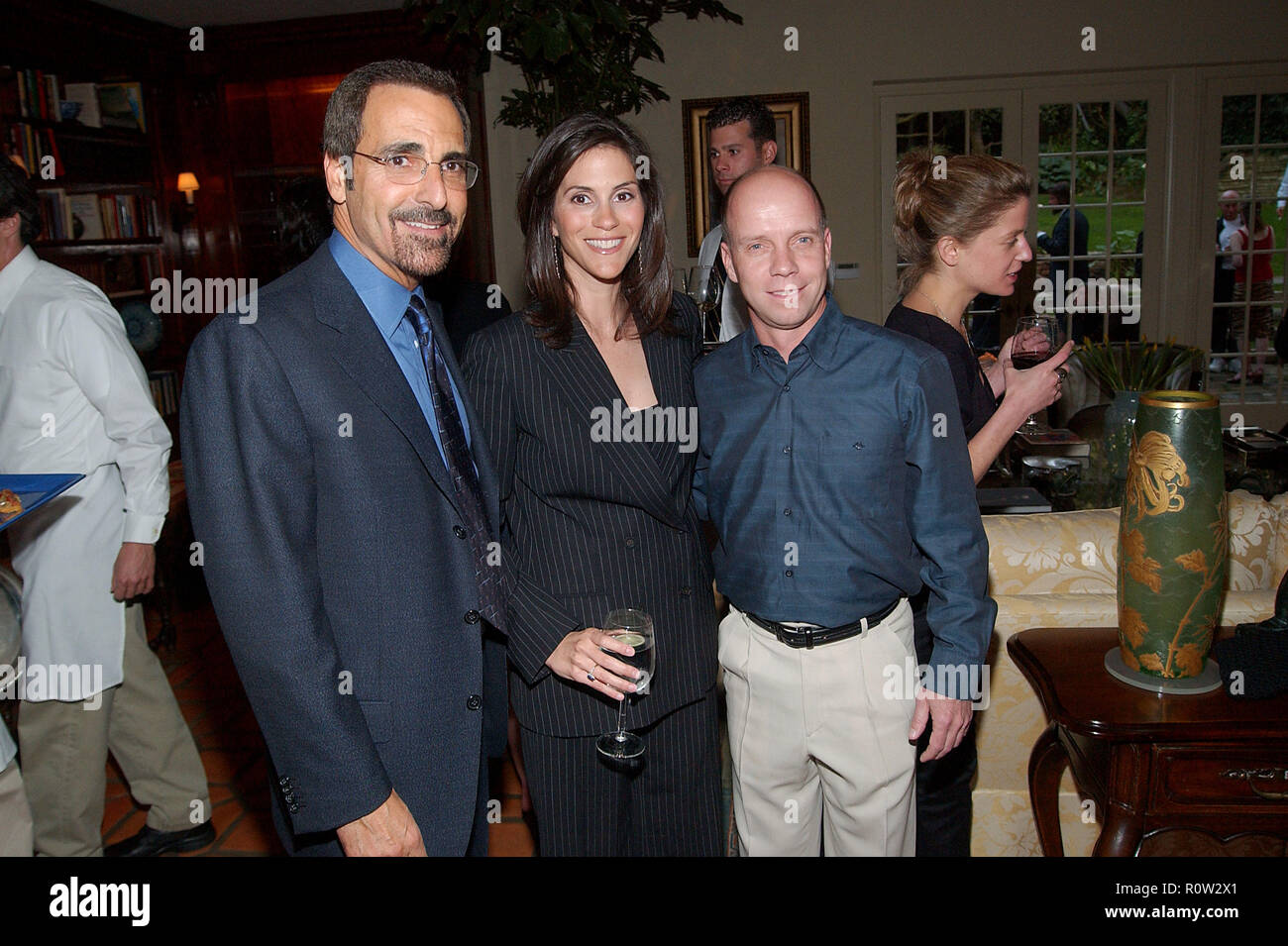 Jami Gertz with skater Scott Hamilton and Tony Thomas ( brother of