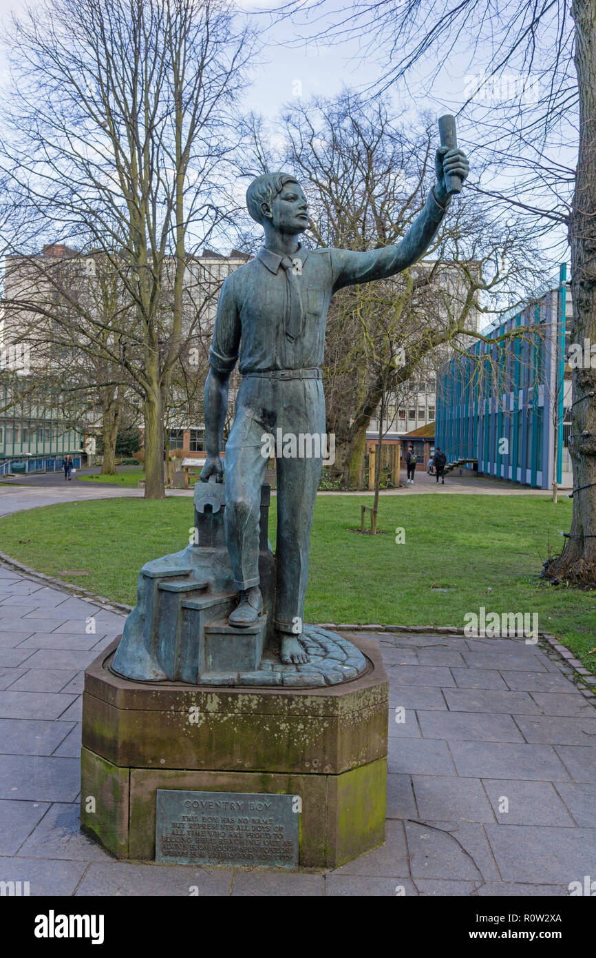 Coventry Boy statue, a shoeless boy holding an apprenticeship scroll denoting success from poor beginnings; Coventry, UK Stock Photo