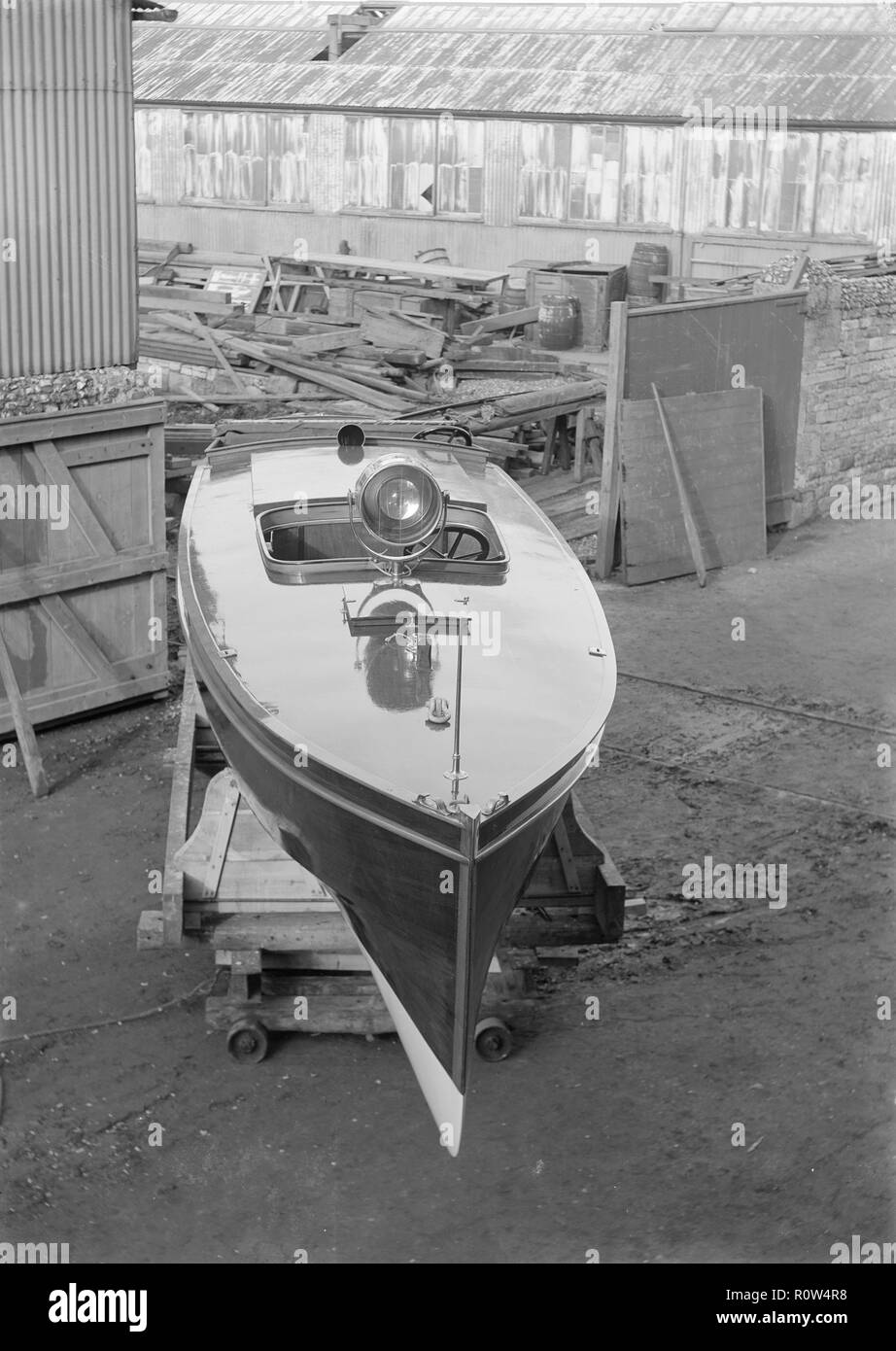 Motor launch in boatyard, 1913. Creator: Kirk & Sons of Cowes. Stock Photo