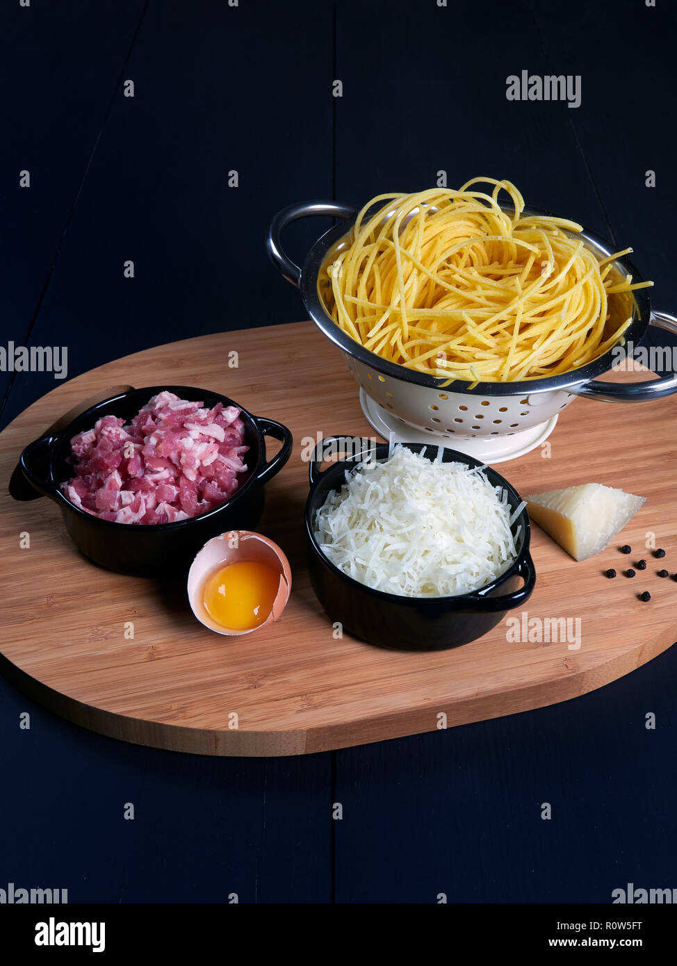 Ingredients for spaghetti carbonara fresh spaghetti, grated pecorino