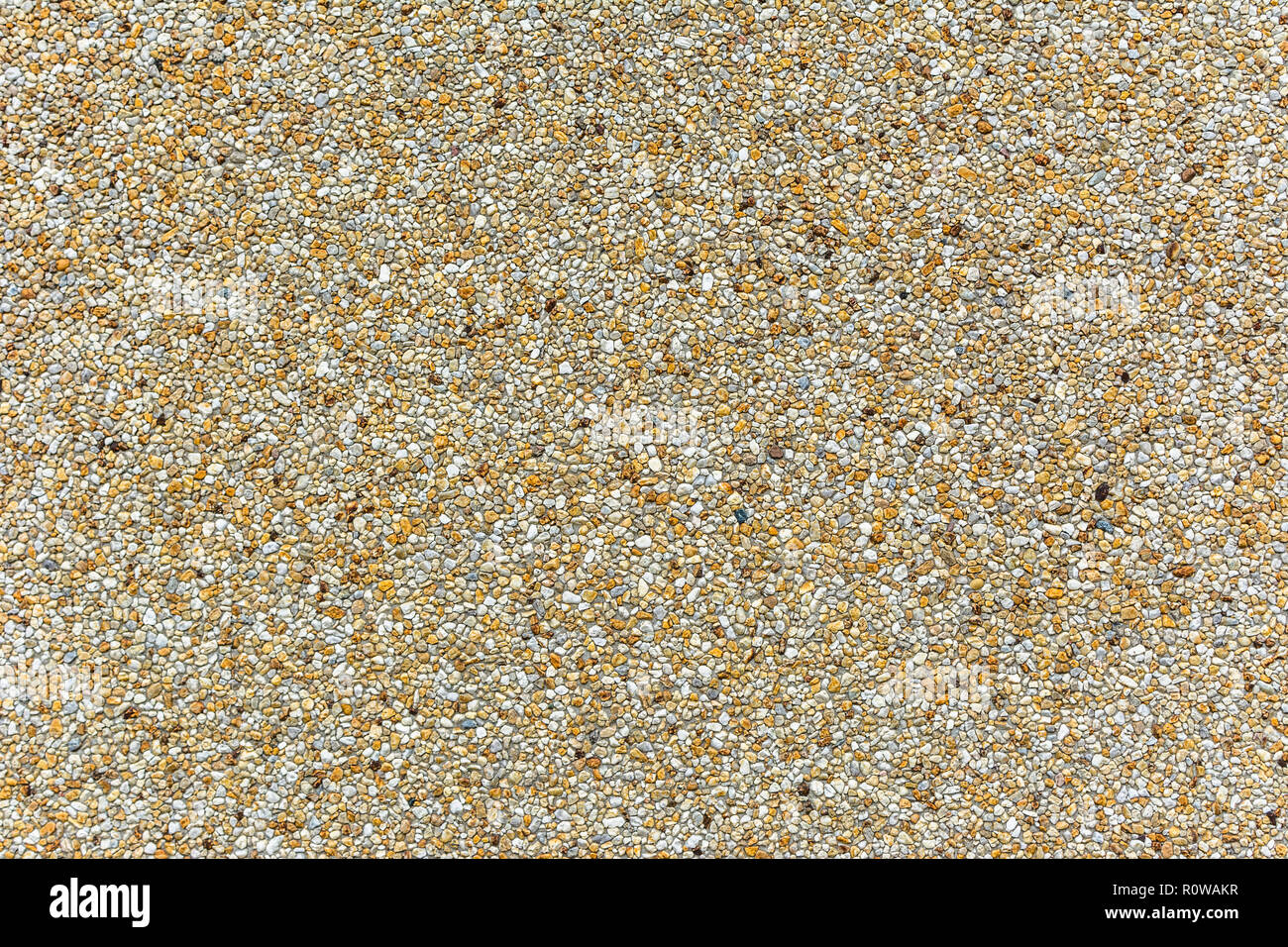Wall of small stones texture background, natural gravel background ...