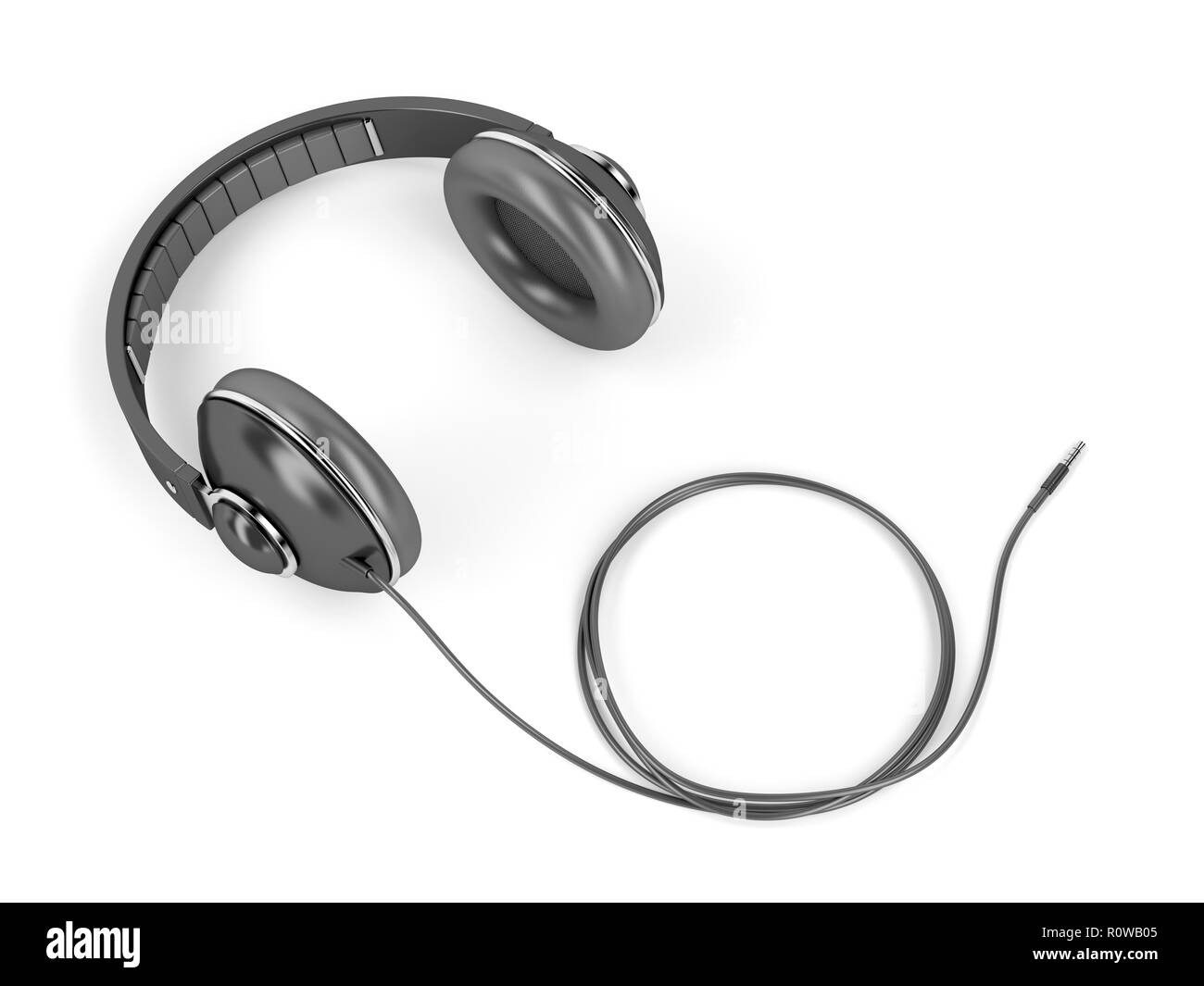Black wired headphones with 3.5mm headphone connector on white background Stock Photo