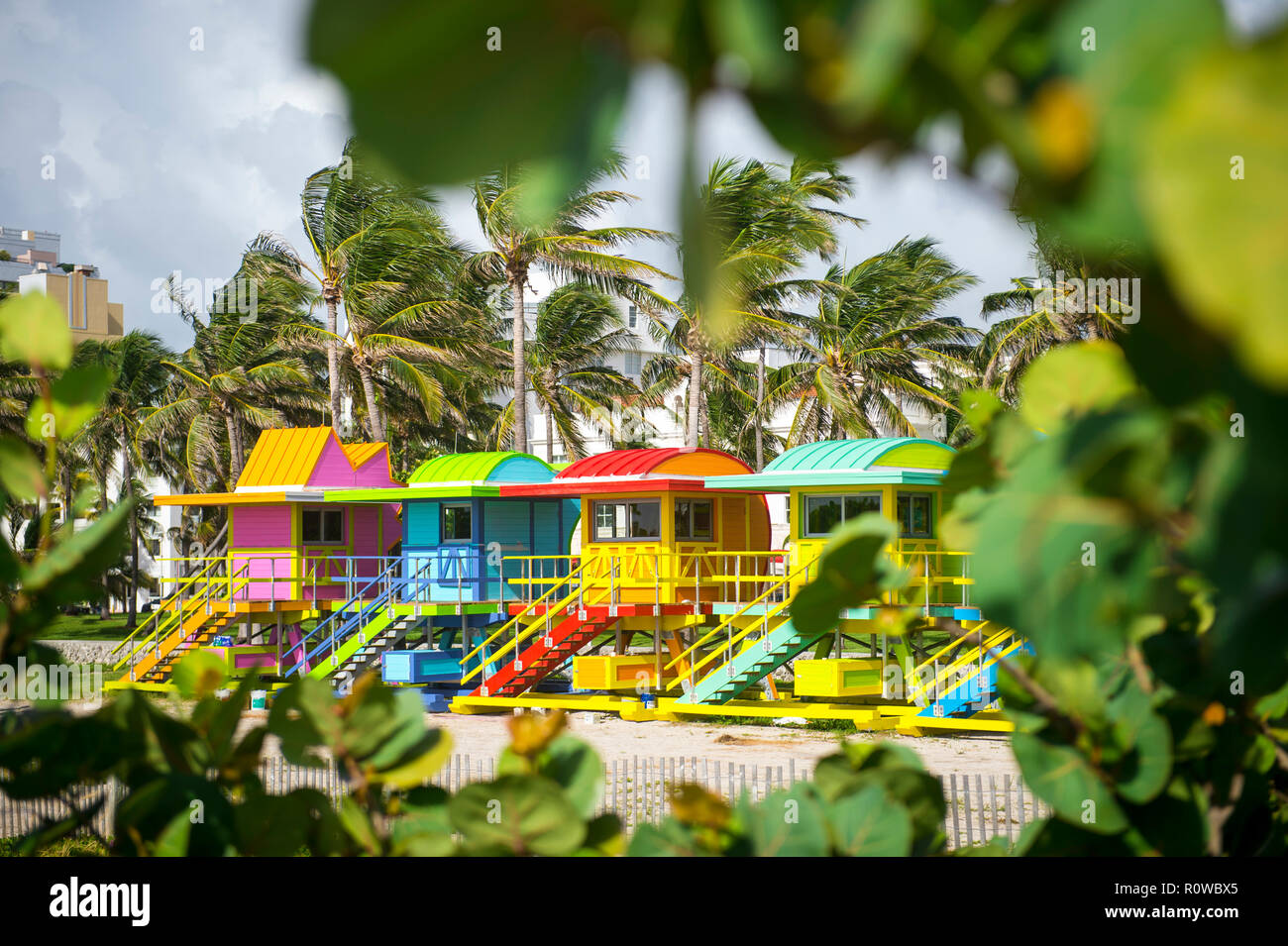 Bright scenic view of vibrantly colored lifeguard towers framed by