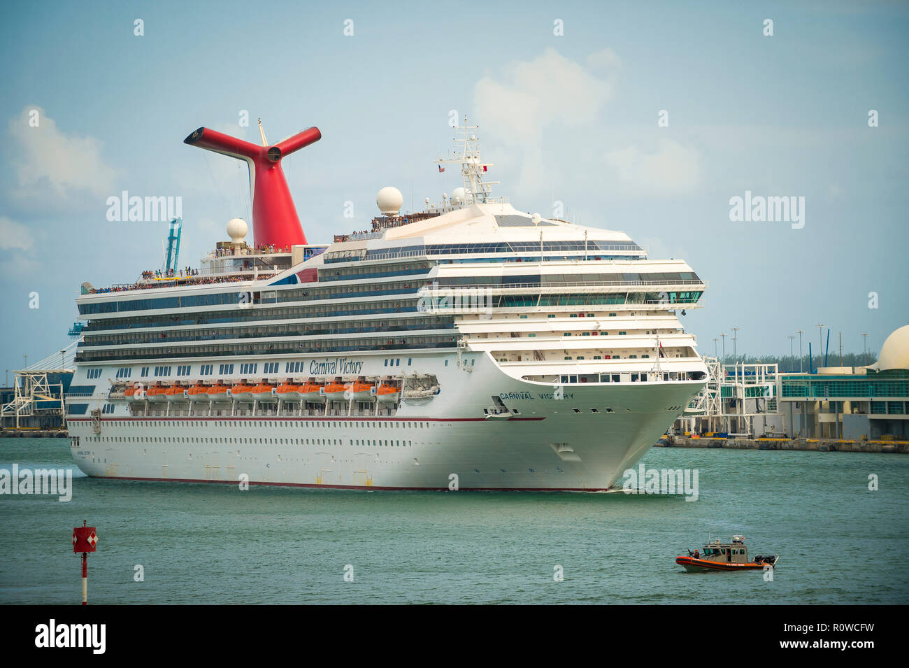 MIAMI - CIRCA SEPTEMBER, 2018: The Carnival Victory cruise ship enters the Port of Miami on a weekend turnaround. Stock Photo