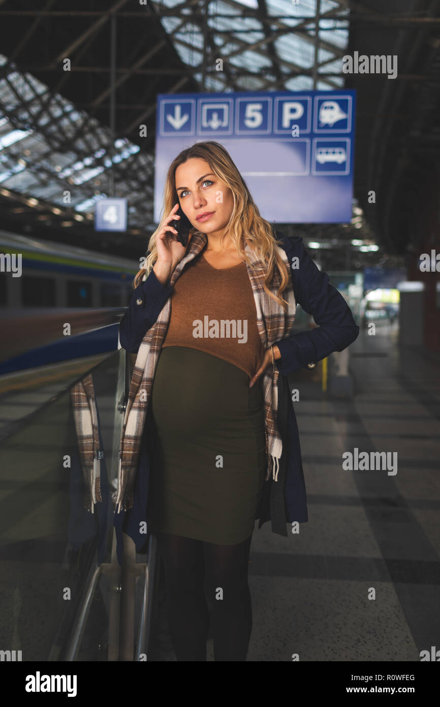 Pregnant woman standing train hi-res stock photography and images - Alamy