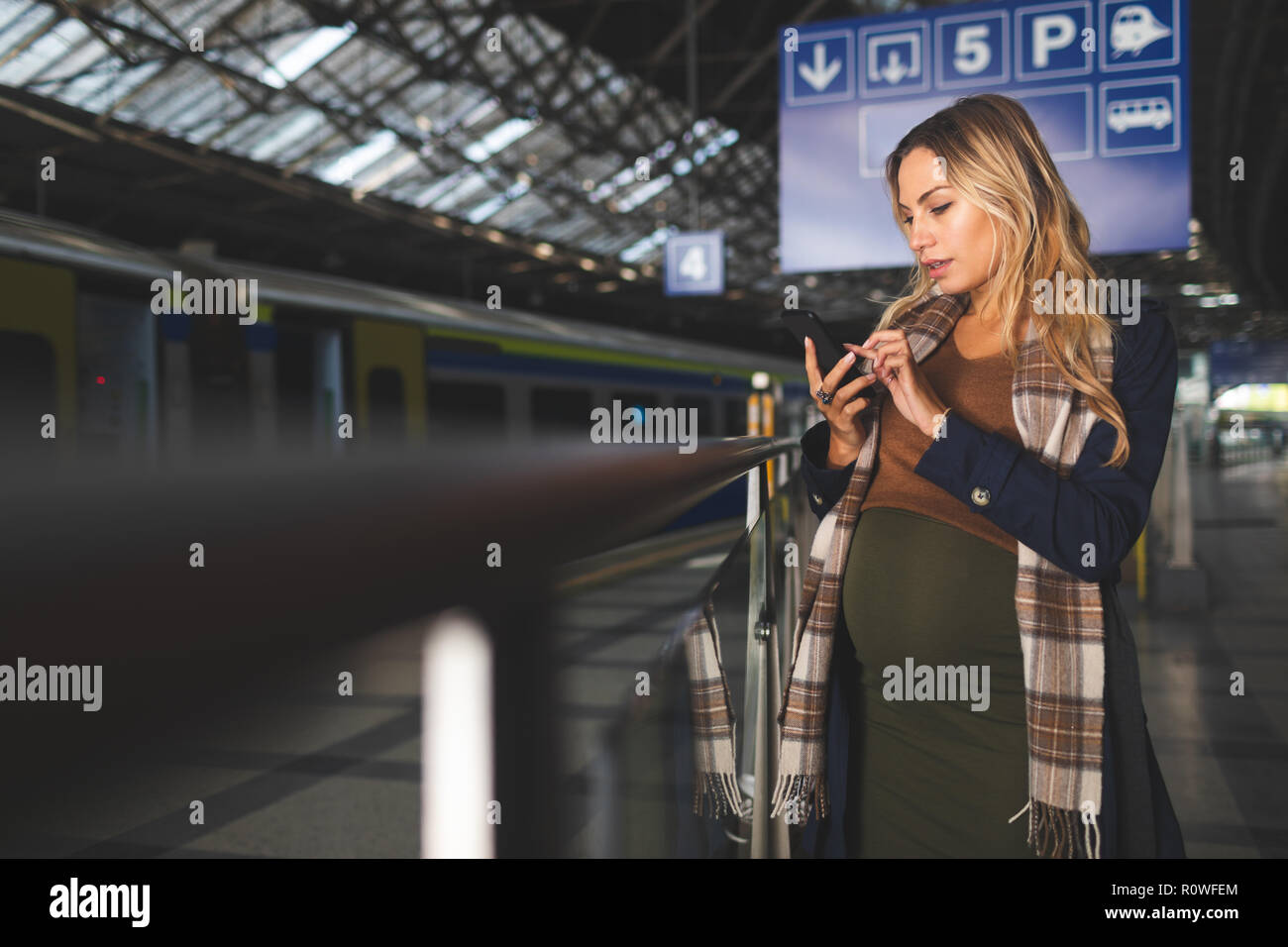 Pregnant woman standing train hi-res stock photography and images - Alamy