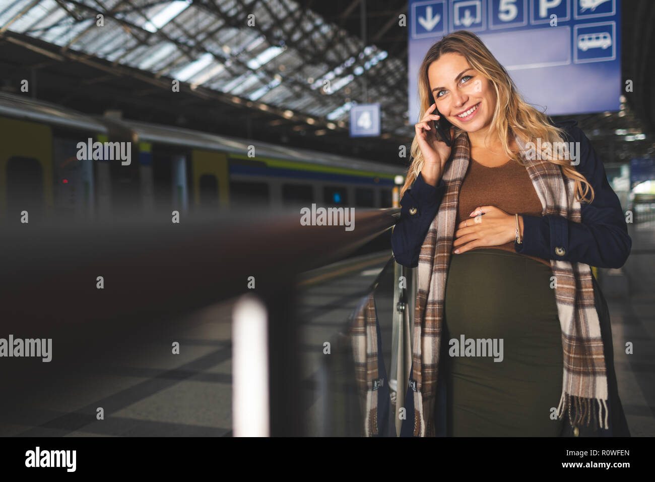 Pregnant woman standing train hi-res stock photography and images - Alamy