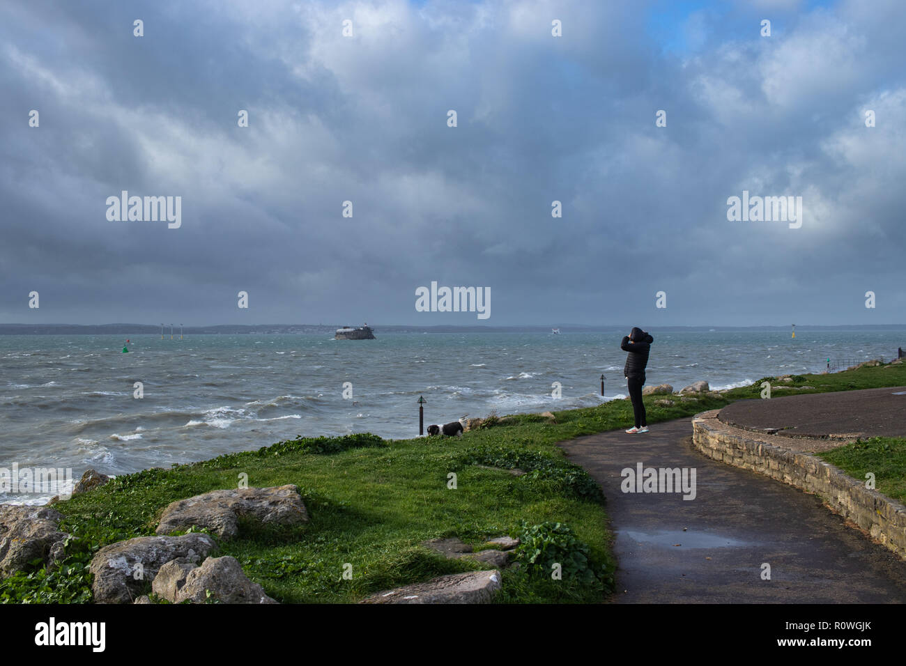 Woman and stormy sea hi-res stock photography and images - Alamy