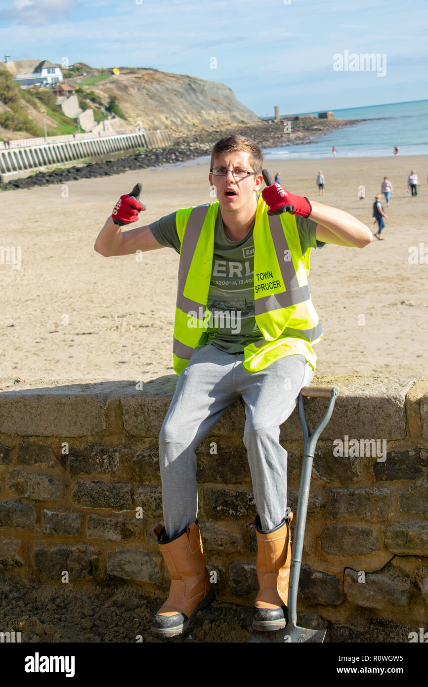 Folkestone Town Sprucer Worker. they give up their time to keep Folkestone looking clean and tidy for everyone to enjoy and make it look lovely. Stock Photo