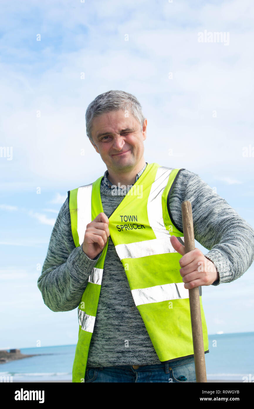 Folkestone Town Sprucer worker. they give up there time to keep folkestone looking clean and tidy for everyone to enjoy and make it look lovely. Stock Photo