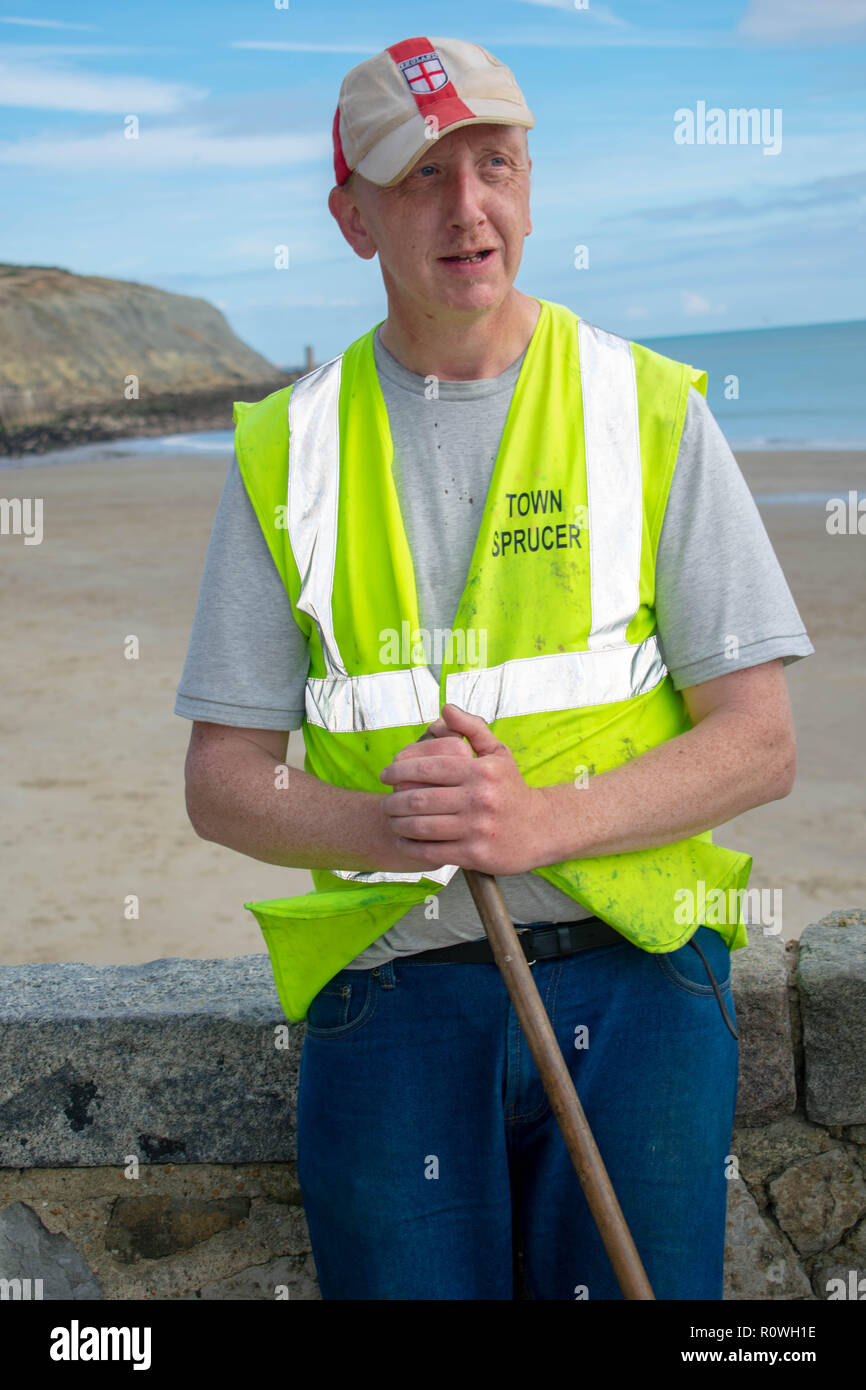 Folkestone Town Sprucer Worker. they give up there time to keep folkestone looking clean and tidy for everyone to enjoy and make it look lovely. Stock Photo