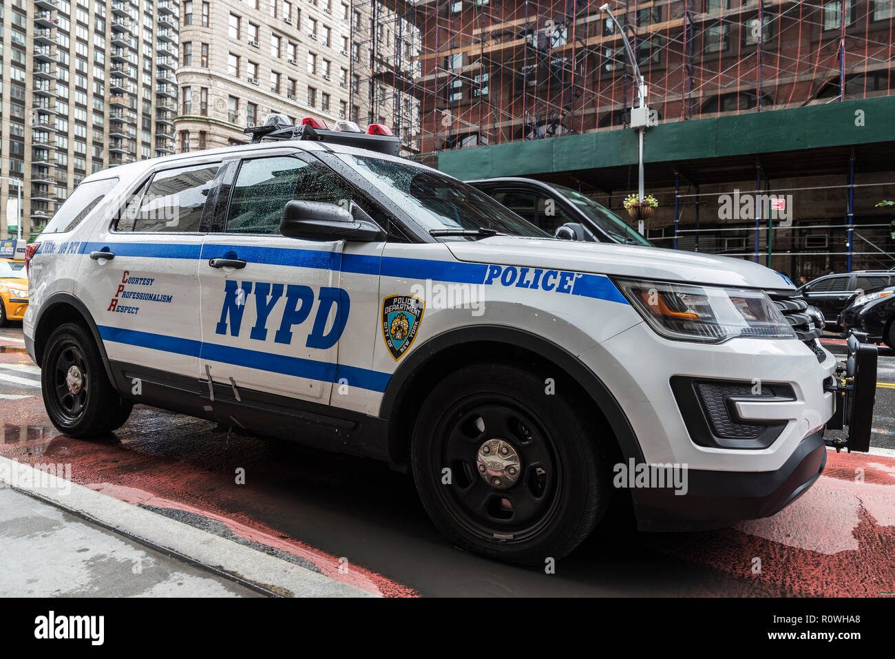 New York City, USA - July 25, 2018: Police car parked on street with its logo in New York City, USA Stock Photo