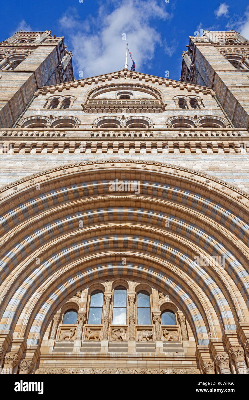 London, South Kensington.  Looking up from the Romanesque main entrance of the Natural History Museum in Cromwell Road. Stock Photo