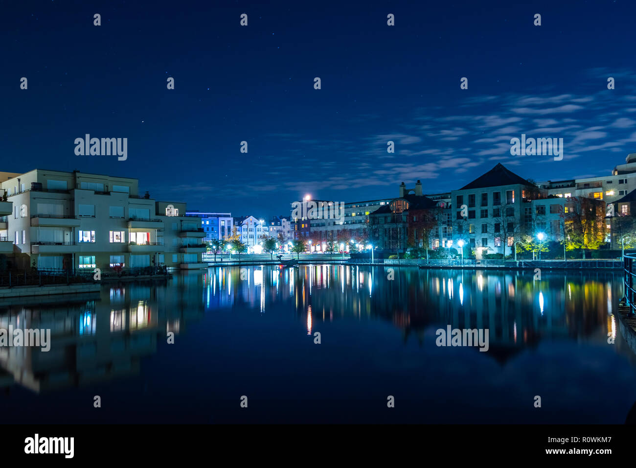 Humboldt Harbour at night with reflections on the water in Berlin Tegel Germany Stock Photo