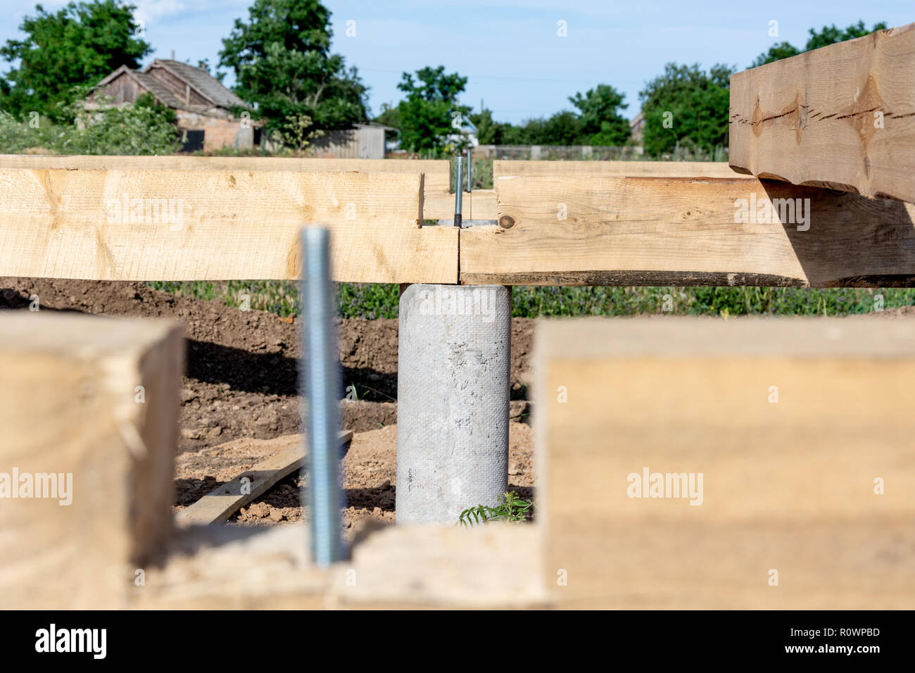 Anchor bolt for connecting pine planks of the frame house. Construction