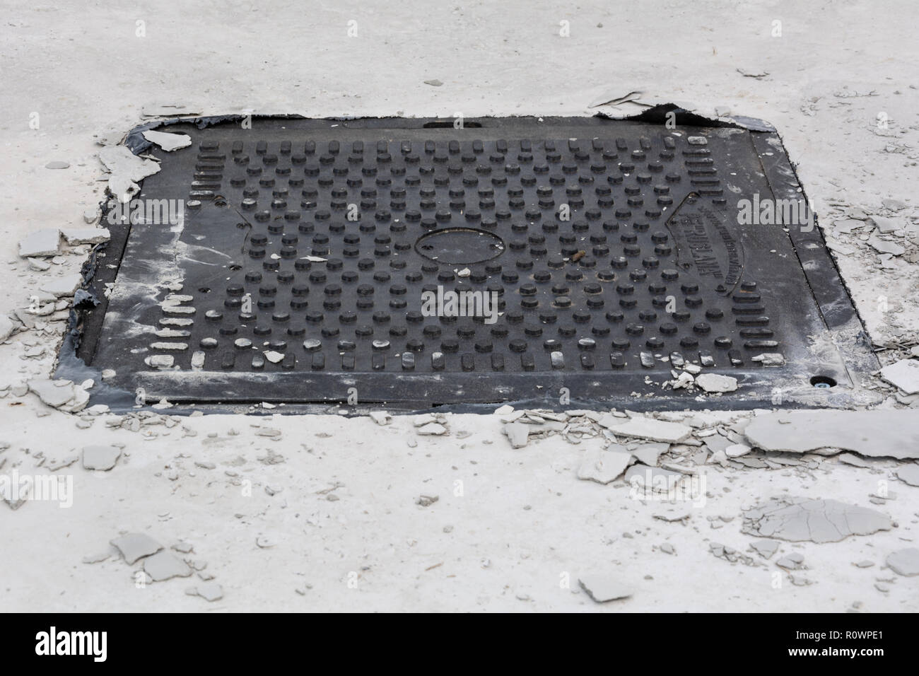 The hatch on a pit for a septic tank. Sewerage construction. Stock Photo