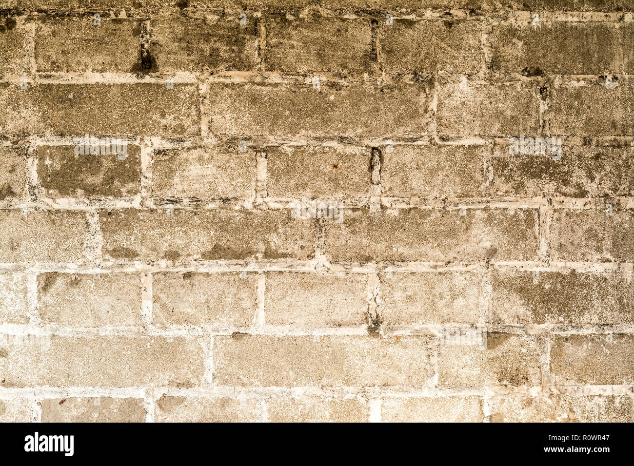 Old vintage grunge brick wall with cracks close-up texture background ...