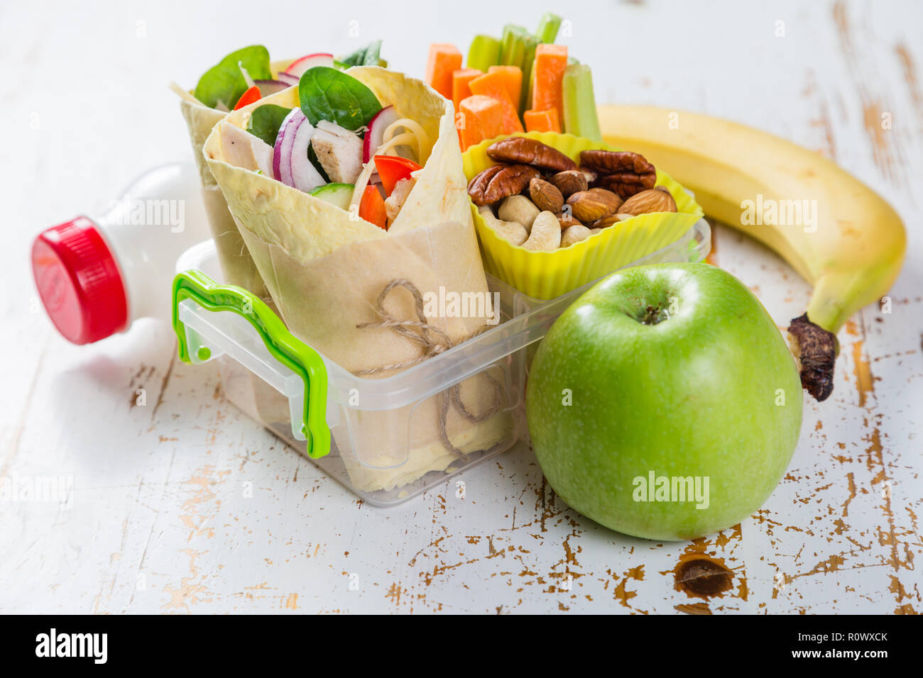 Lunch to go with tortilla wraps and vegetables Stock Photo Alamy