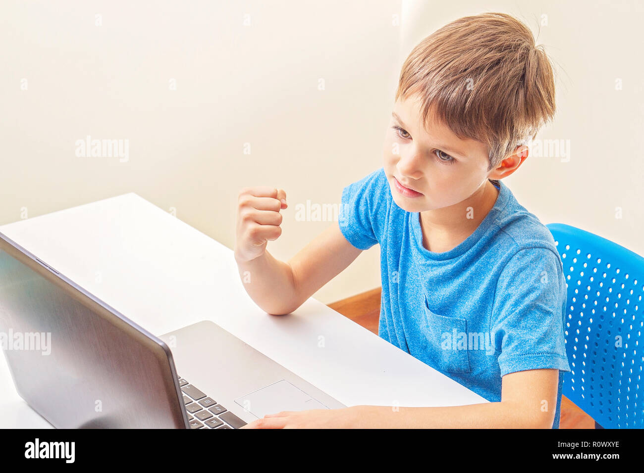 kid playing computer