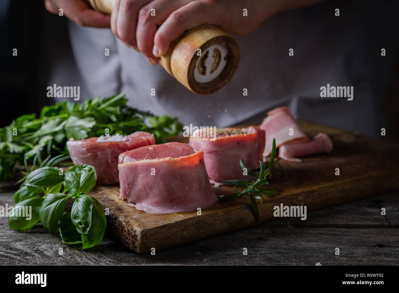 Preparing filet mignon hands seasoning the steak Stock Photo Alamy