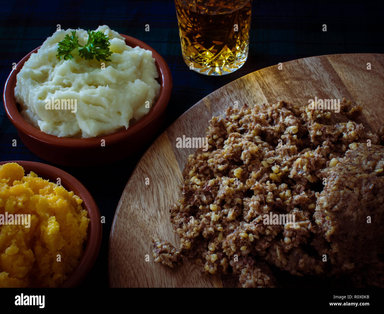 Haggis, with mashed potatoes, mashed swede and a wee dram of Scotch whisky. Burns Night, Scotland Stock Photo