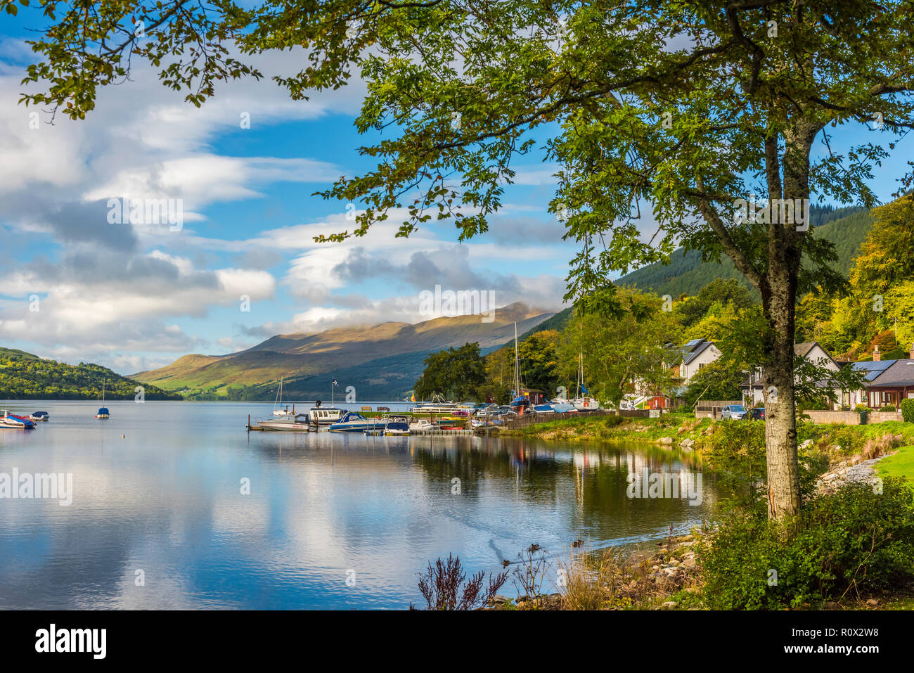Loch Tay and Kenmore village, with Ben Lawers in the distance, Perthshire, Scotland Stock Photo