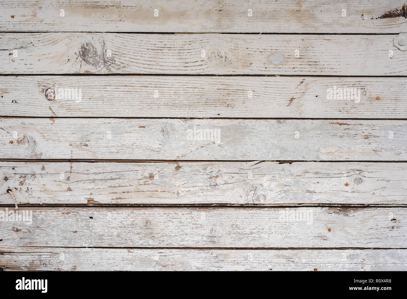 White wood texture for background. Grunge background. Peeling paint on an  old wooden floor. Stock Photo