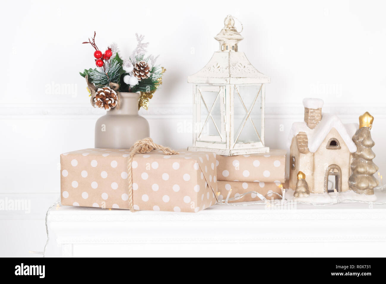 Fireplace Mantle Decorated With Candles And Garlands For Christmas
