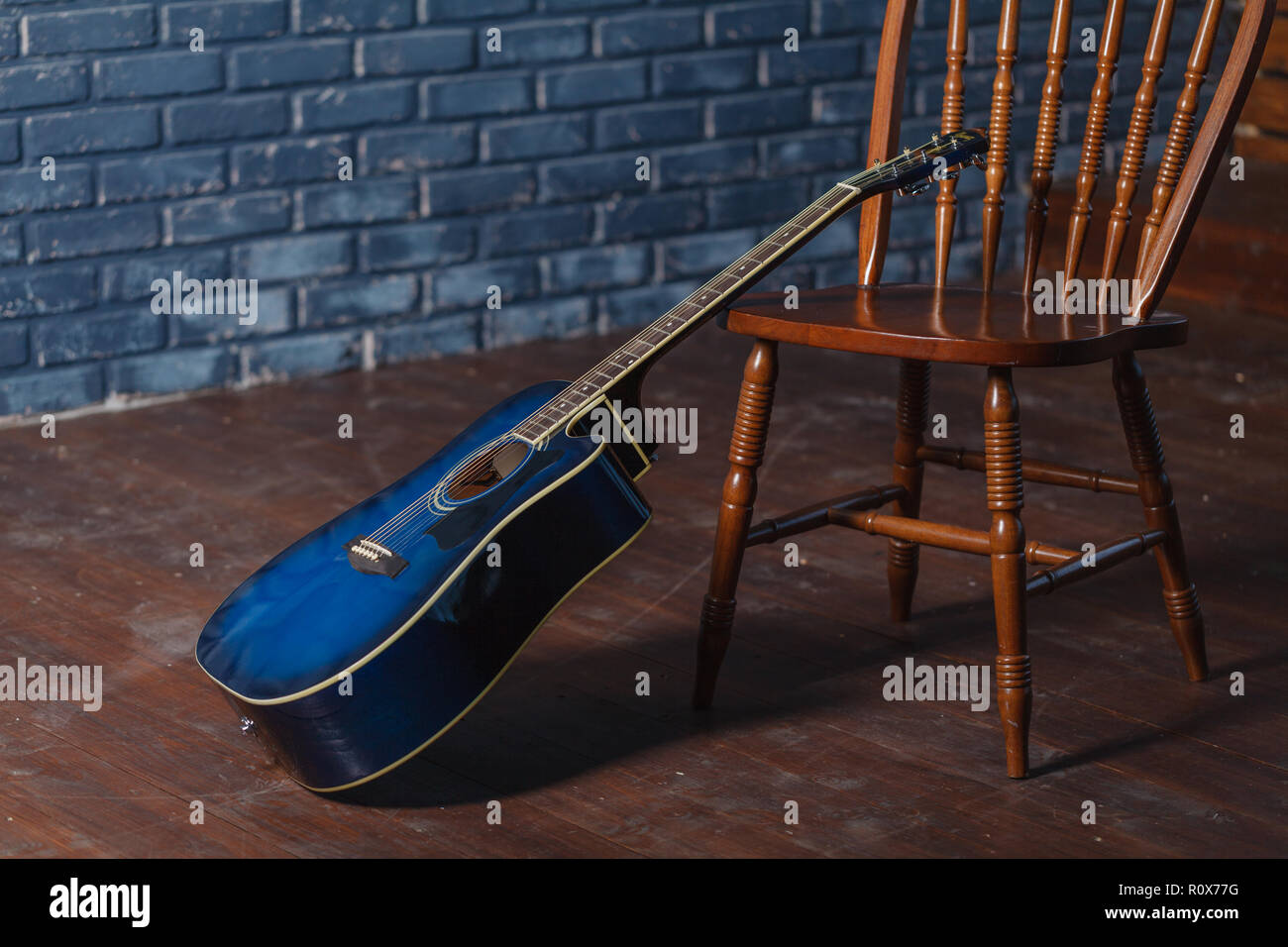 classic wooden guitar on chairs Stock Photo Alamy