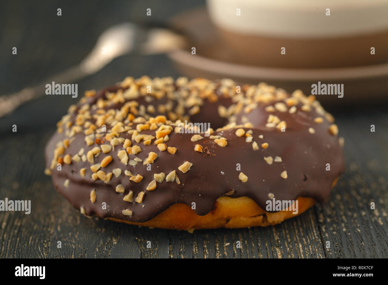 Choco donuts on wooden background. Stock Photo