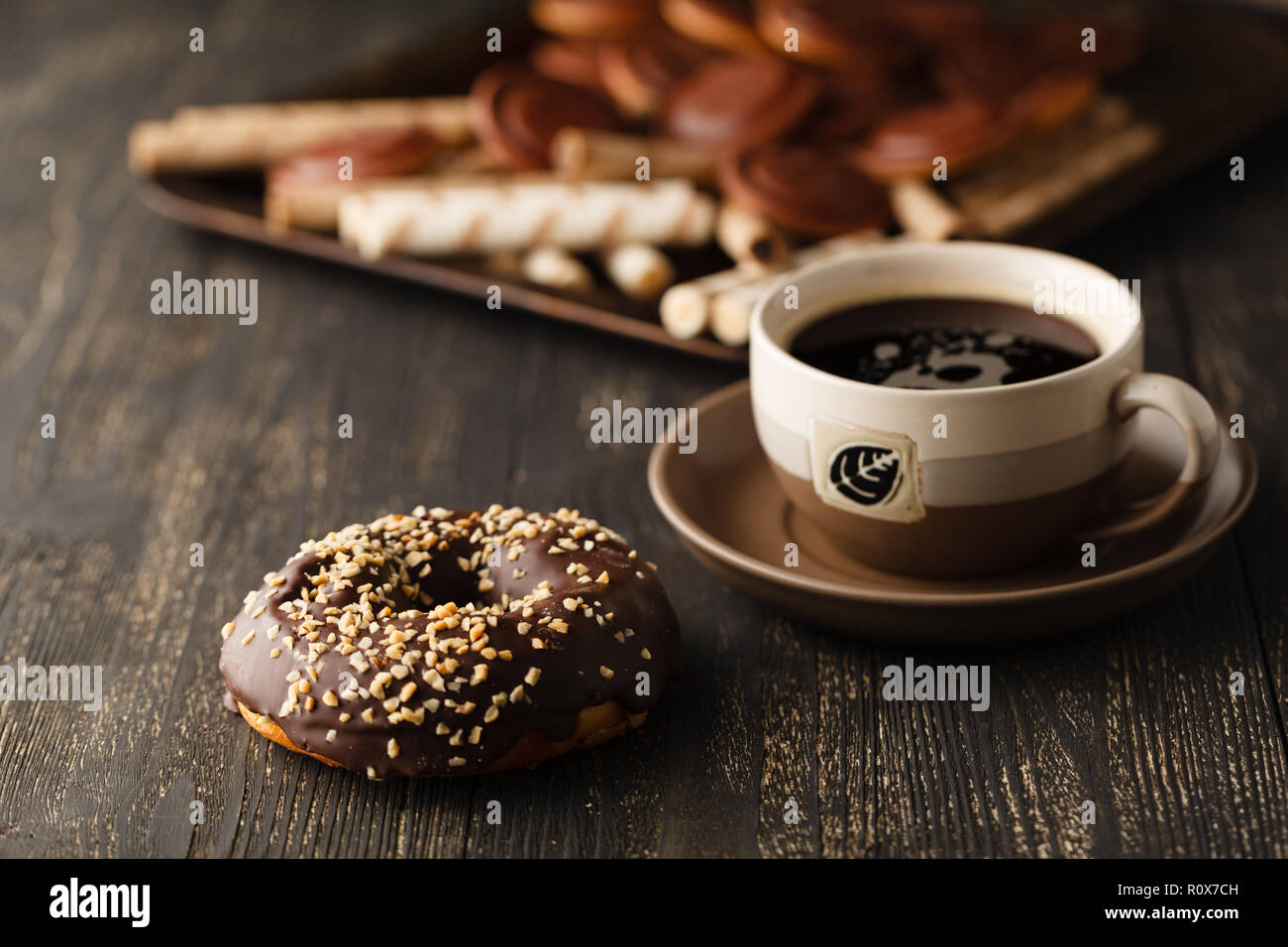 Choco donuts on wooden background. Stock Photo
