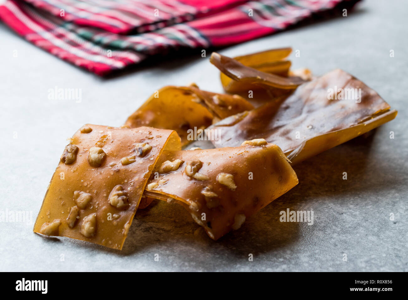 Turkish Pestil / Dried Fruit Pulp with Sesame and Walnut / Churchkhela. Traditional Organic Food. Stock Photo