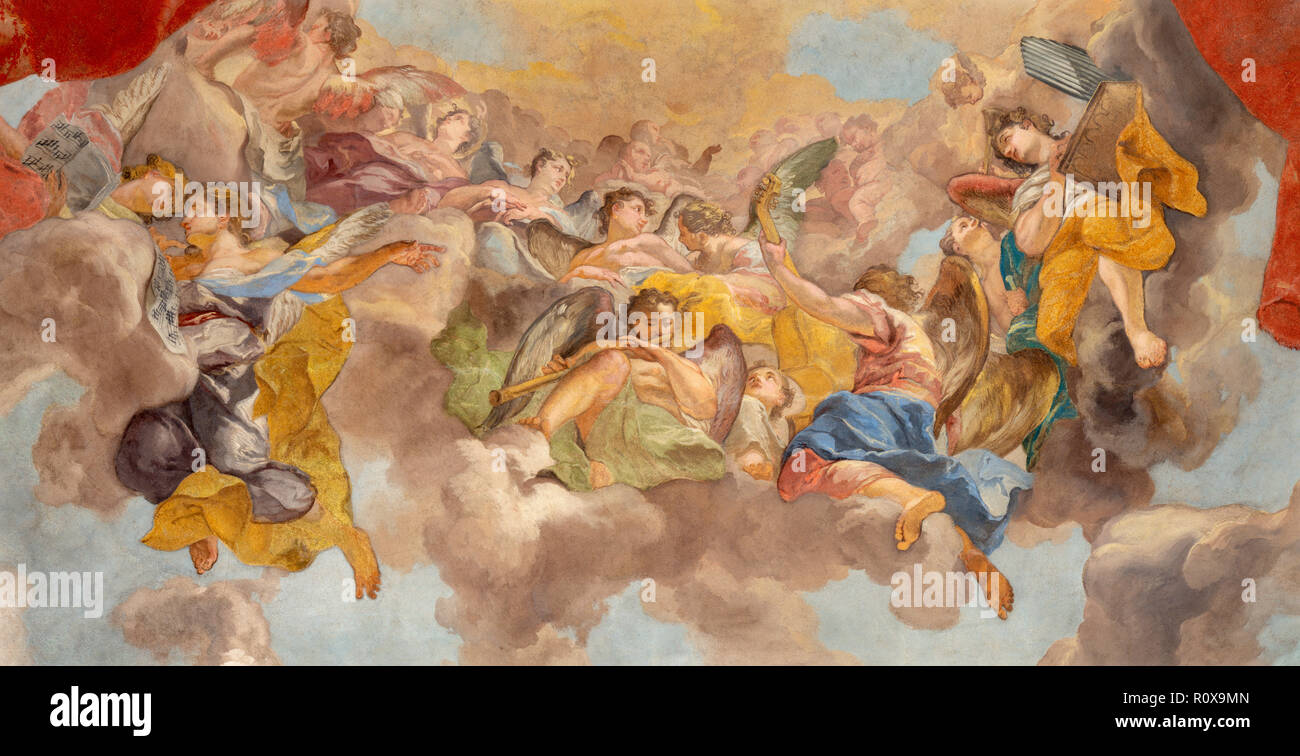 PRAGUE, CZECH REPUBLIC - OCTOBER 12, 2018: The baroque fresco of Angels with the music insturments in church kostel Svateho Tomase Stock Photo