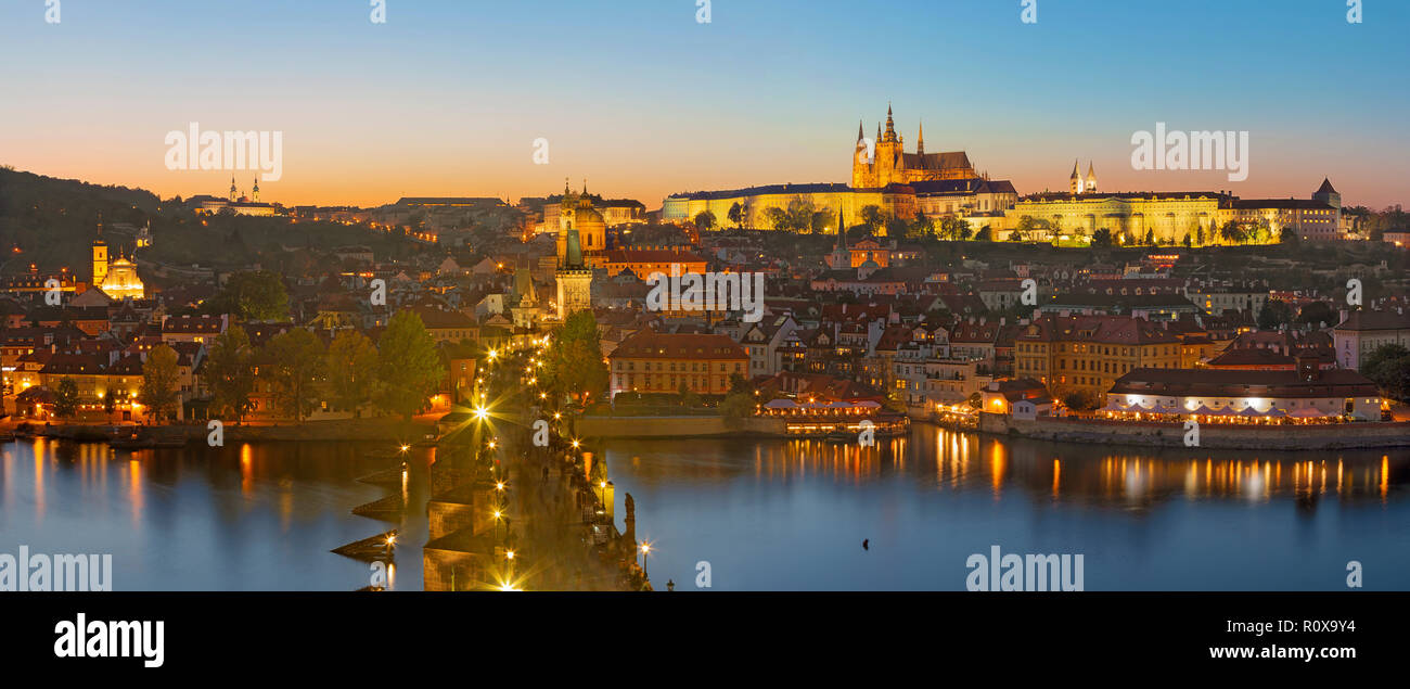 Prague - The Charles Bridge, Castle and Cathedral withe the Vltava river at dusk. Stock Photo