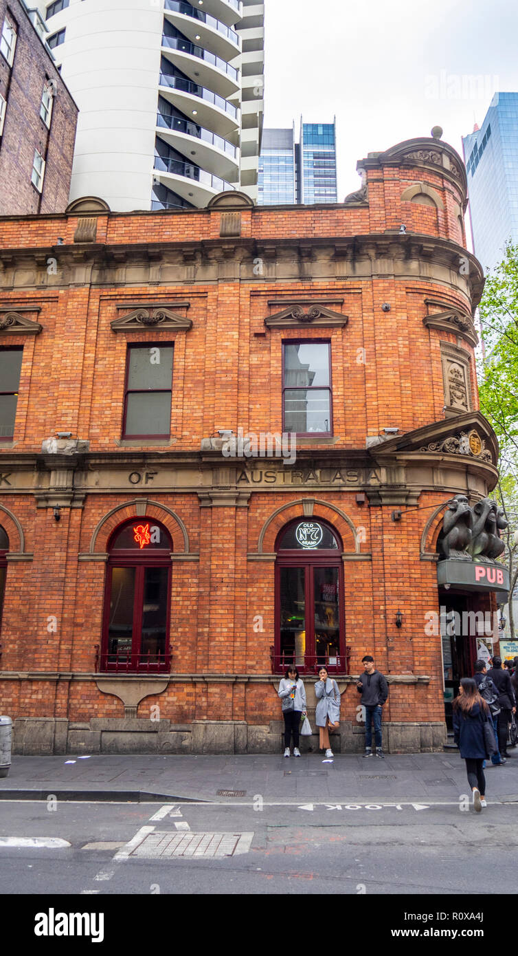 Former Bank of Australasia  now the 3 Wise Monkeys pub on the corner of Liverpool St George Street Sydney NSW Australia. Stock Photo