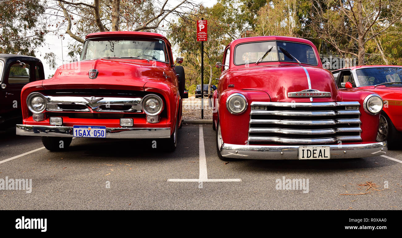 Red vintage pick-up trucks on display Stock Photo