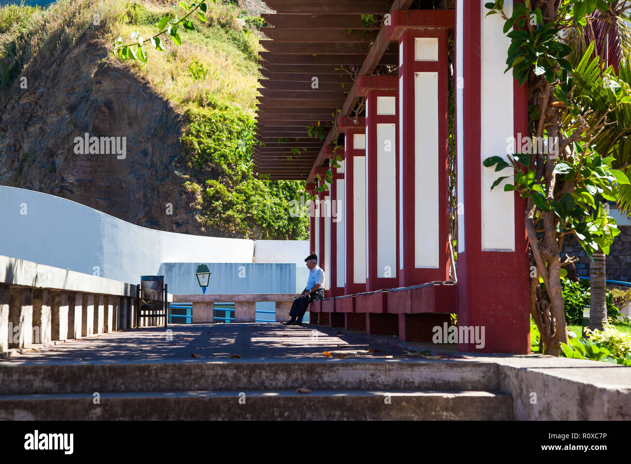 Old man sitting on a bench Stock Photo - Alamy
