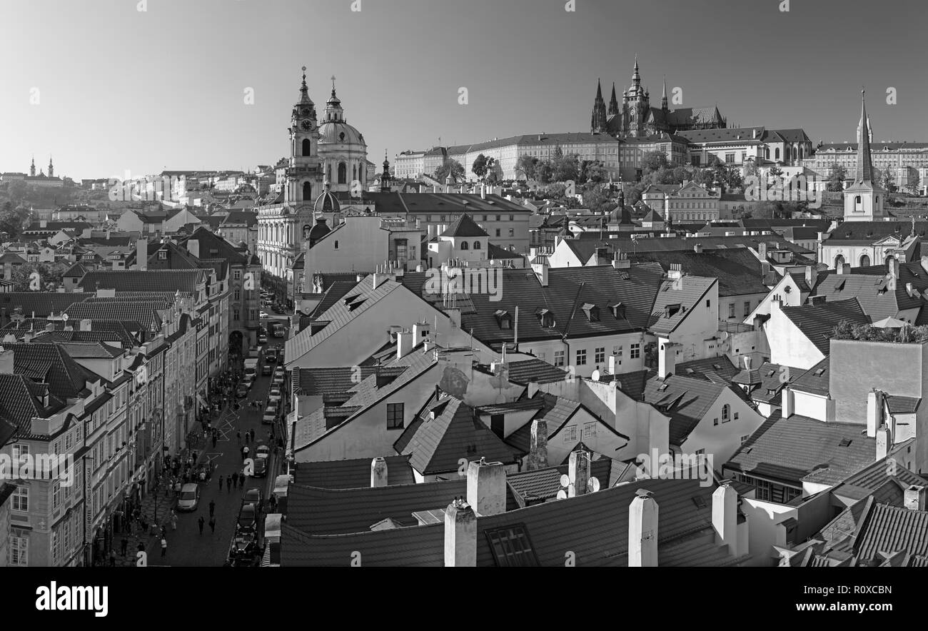 Prague - The roofs of Mala Strana with the St. Nicholas church, Castle and the Cathedral. Stock Photo