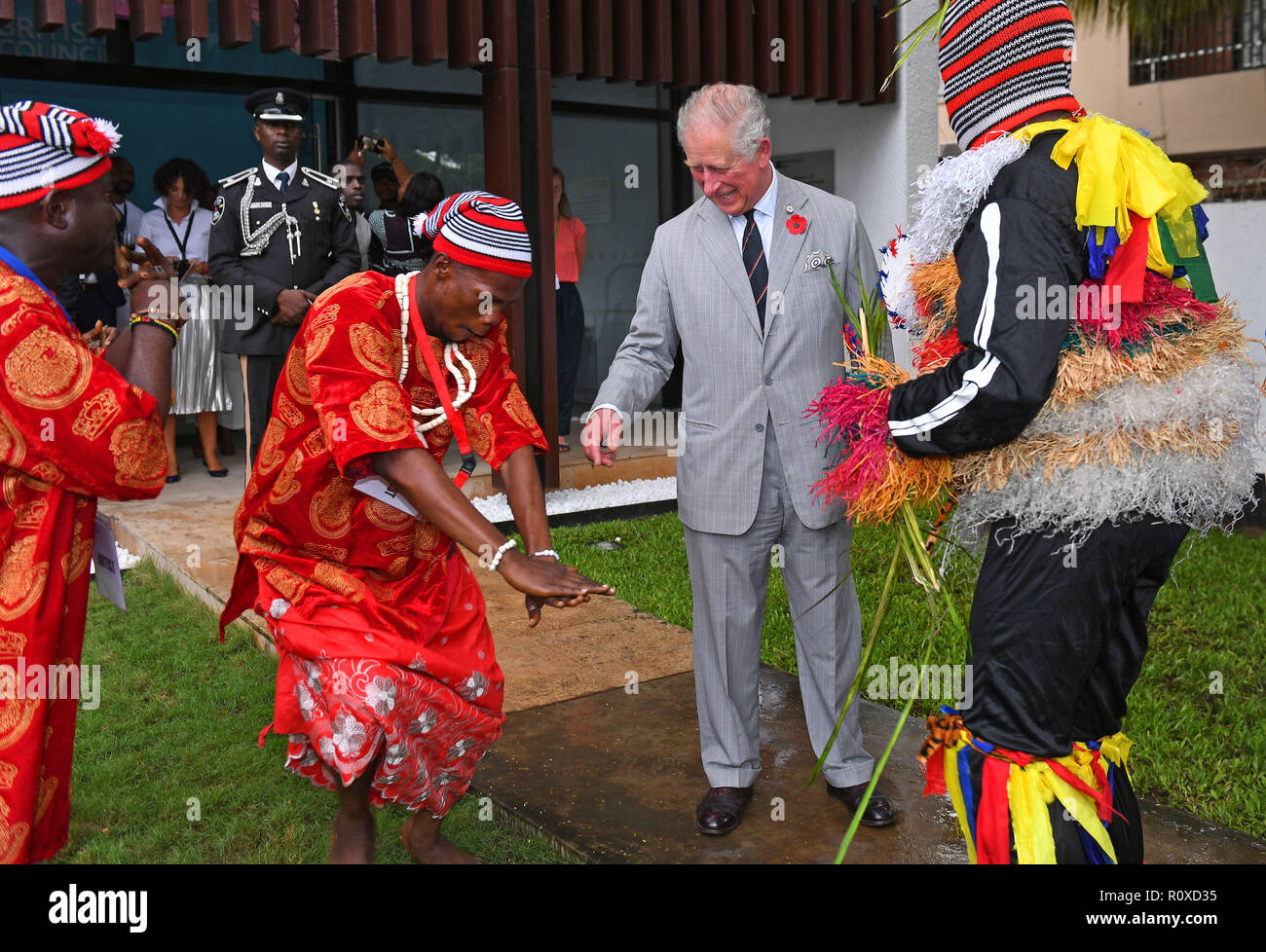 The Prince of Wales watches some dancing during his visit to the