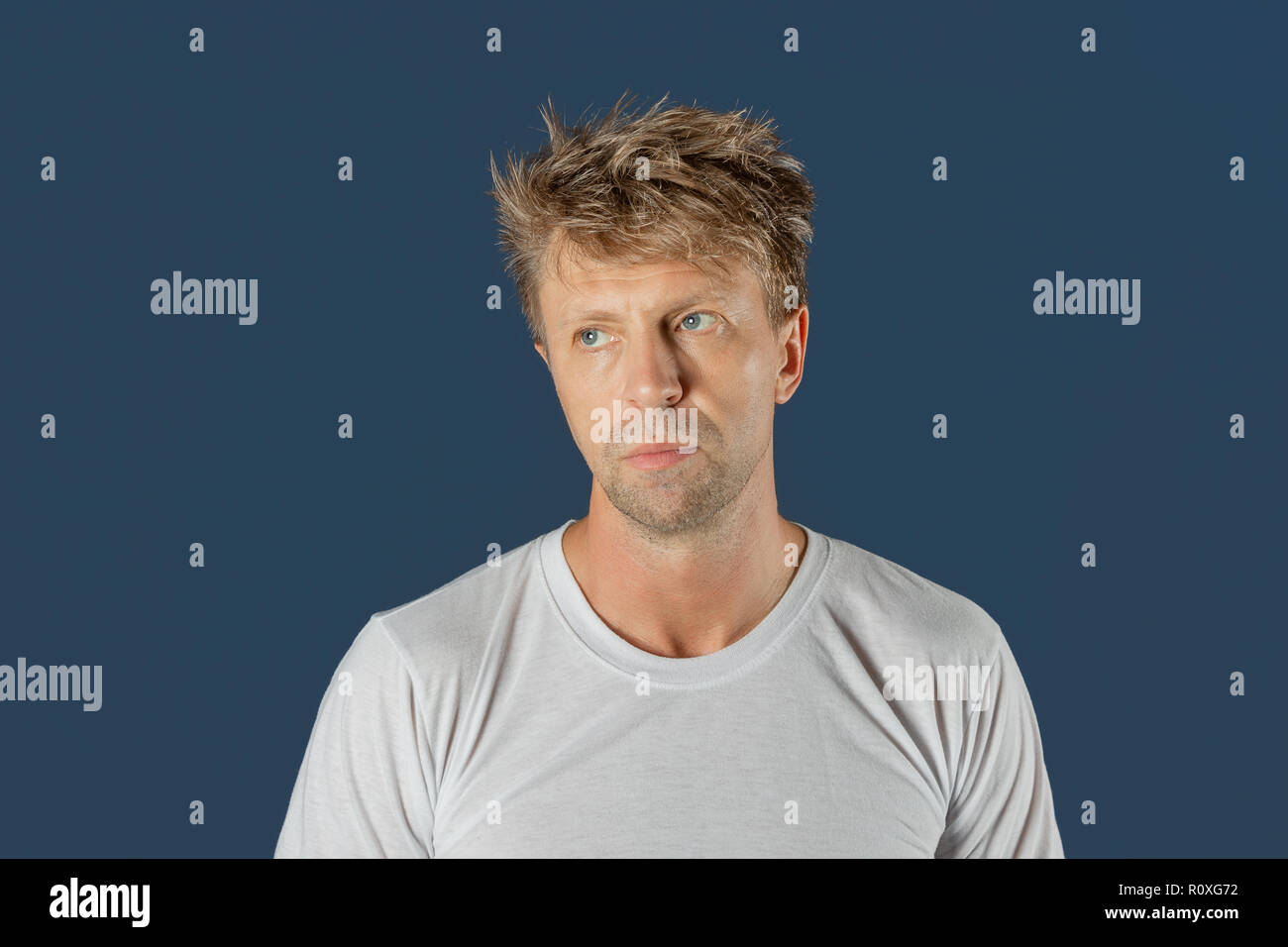 Sad handsome young man hi-res stock photography and images - Alamy