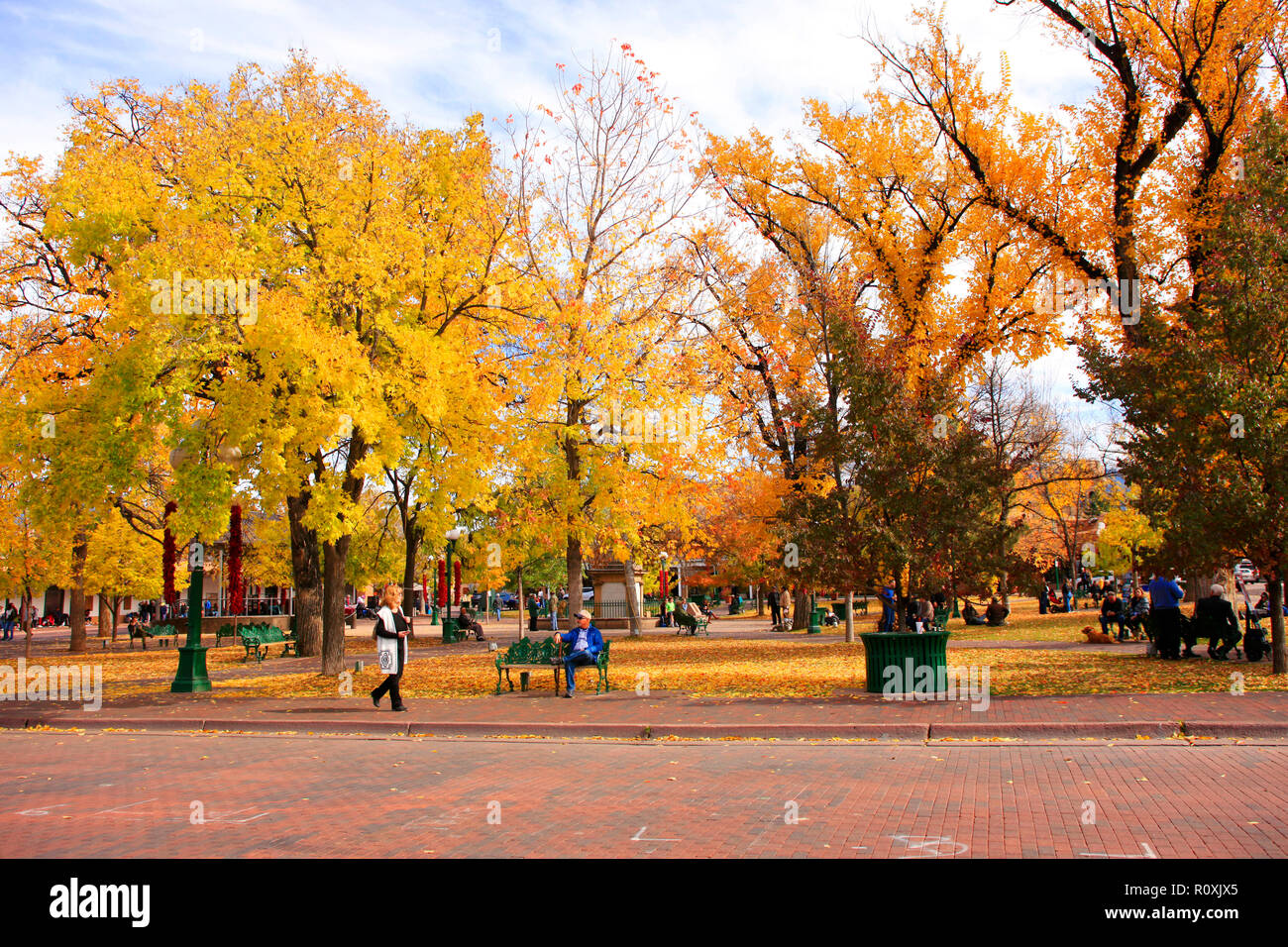 People enjoying the Fall colors and temps in the Santa Fe Plaza in