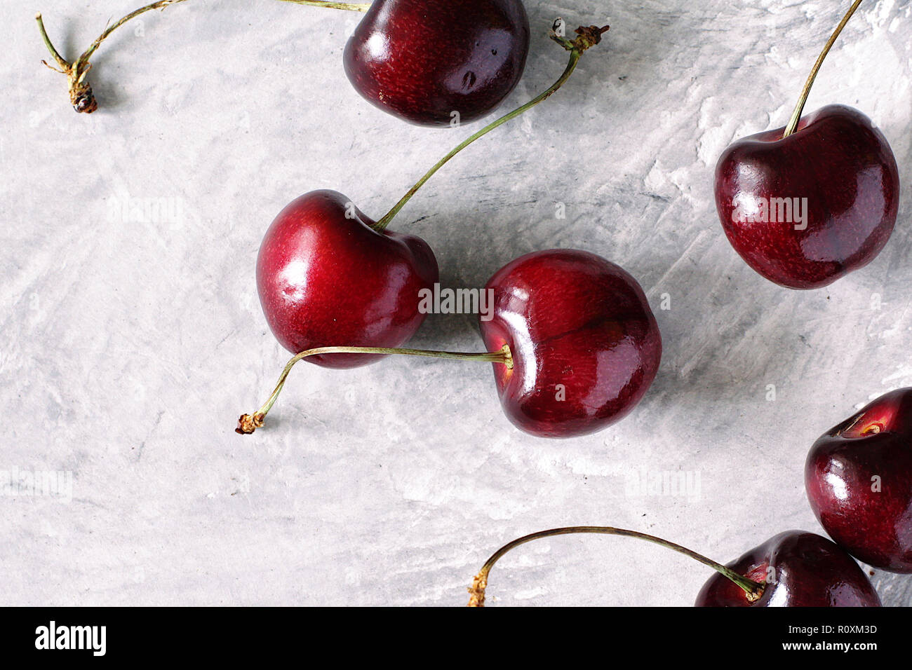 delicious cherries on a white board Stock Photo