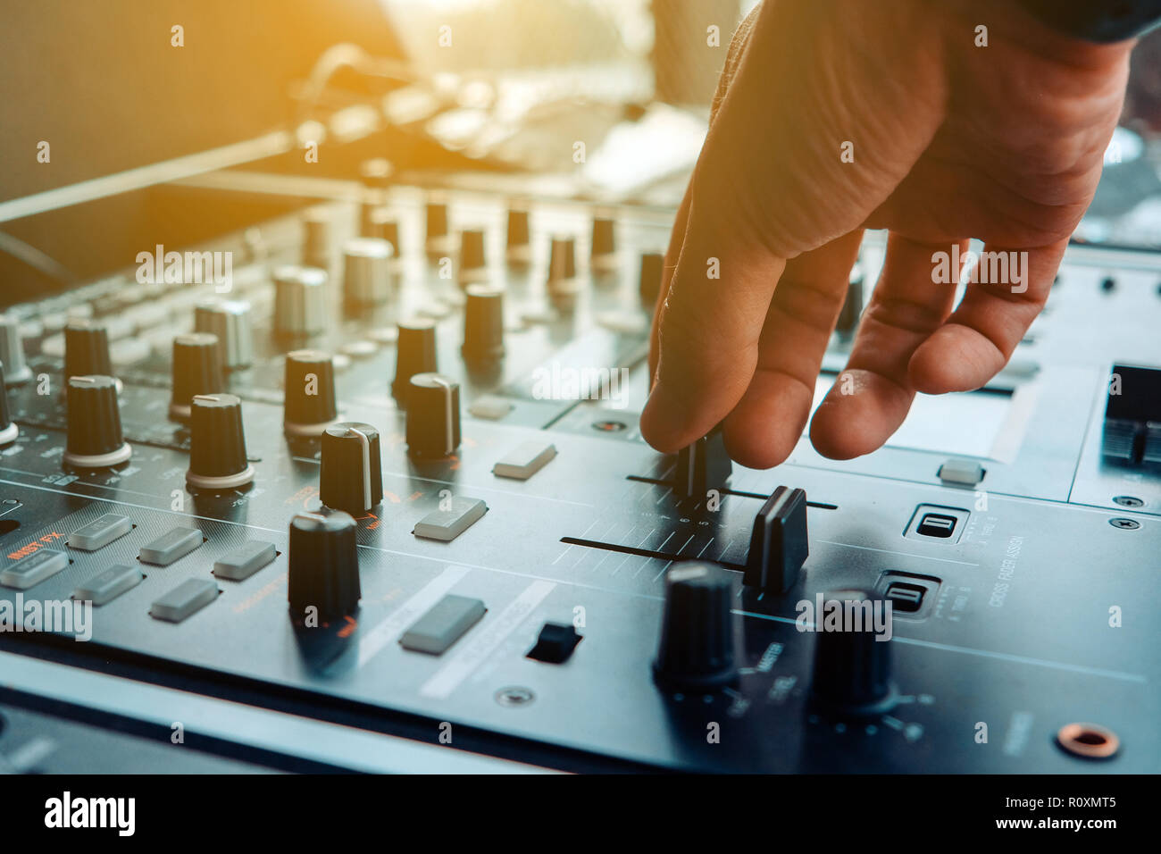Close up image of DJ turntable console mixer controlling Stock Photo ...